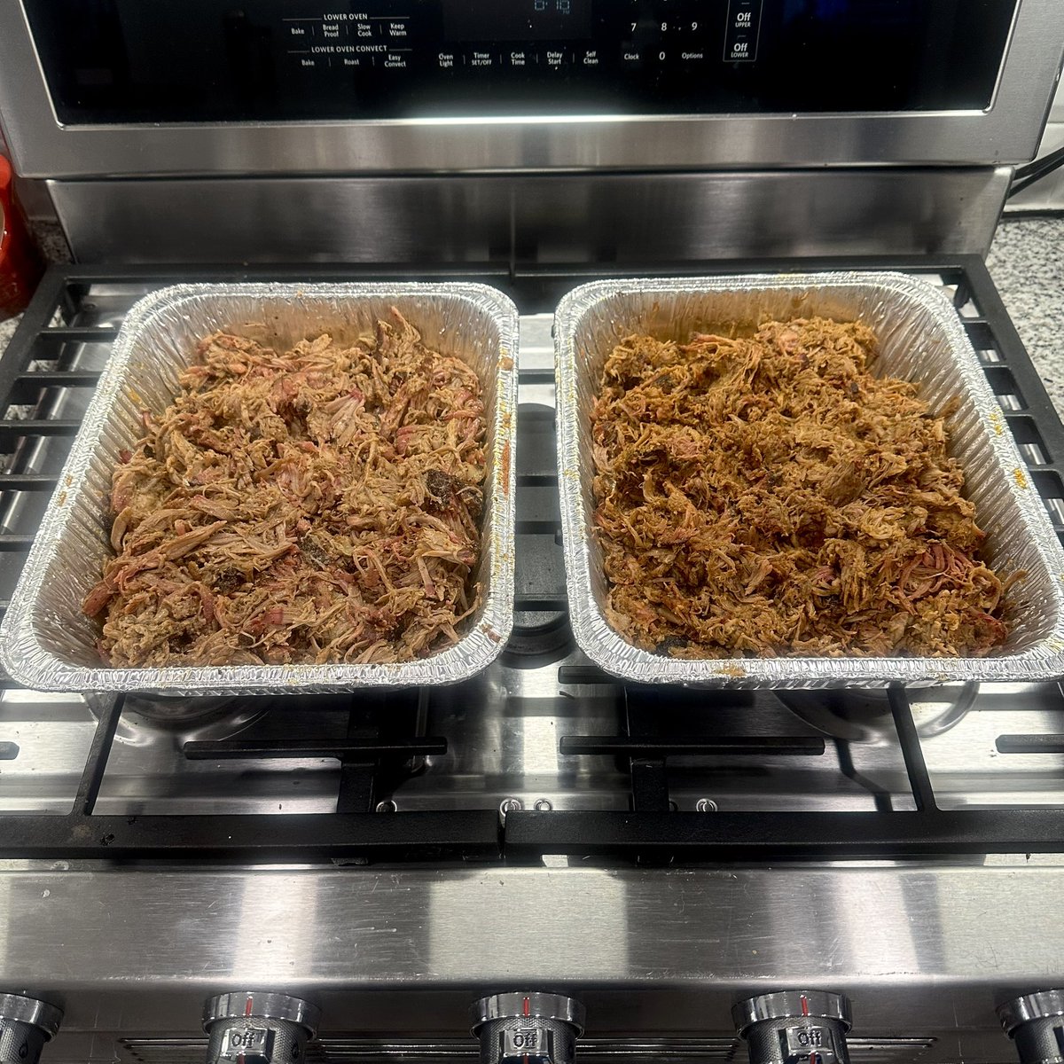 Delicious pulled pork for dinner tonight!

These two butts were smoked on my <a href="/TraegerGrills/">Traeger Grills</a> Timberline XL for 10 hours at 225 - one seasoned with <a href="/jesspryles/">Jess Pryles</a> Hardcore Carnivore Red - the other with <a href="/LanesBBQus/">Lane’s</a> Spellbound.

Separated the fat and put the juice back in. Perfection!