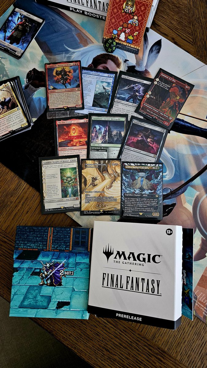 Cracked open a Prerelease kit that I picked up today at my local game store and I finally pulled Dragon of Mount Gulg, a beautiful Final Fantasy Through the Ages card featuring Amanos artwork from FFI - only 13 to go to master the set!