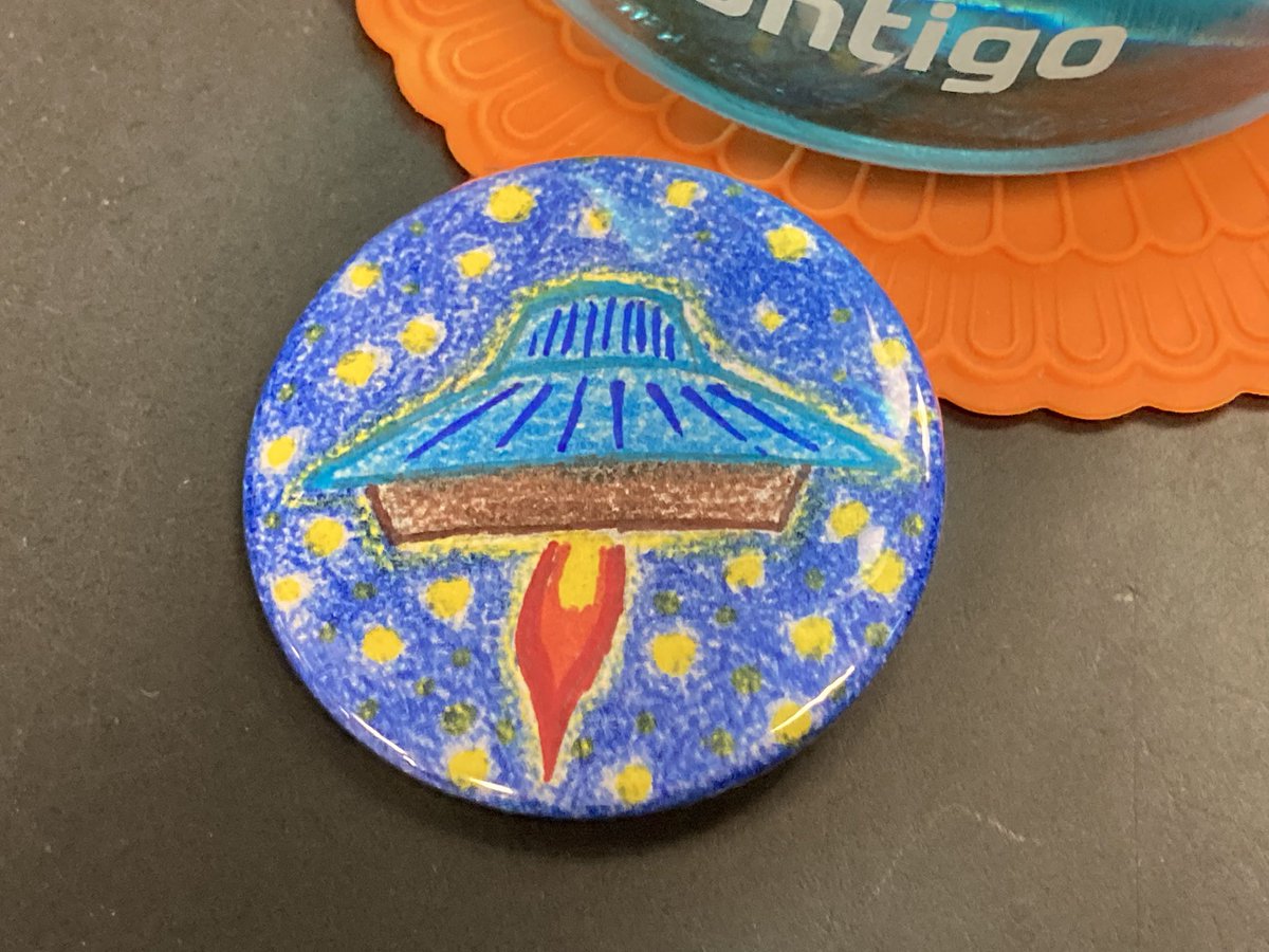 When the library branch you work in is in a round saucer shaped building so you do a little drawing of it as a spaceship while making buttons with a bunch of teen patrons 😊