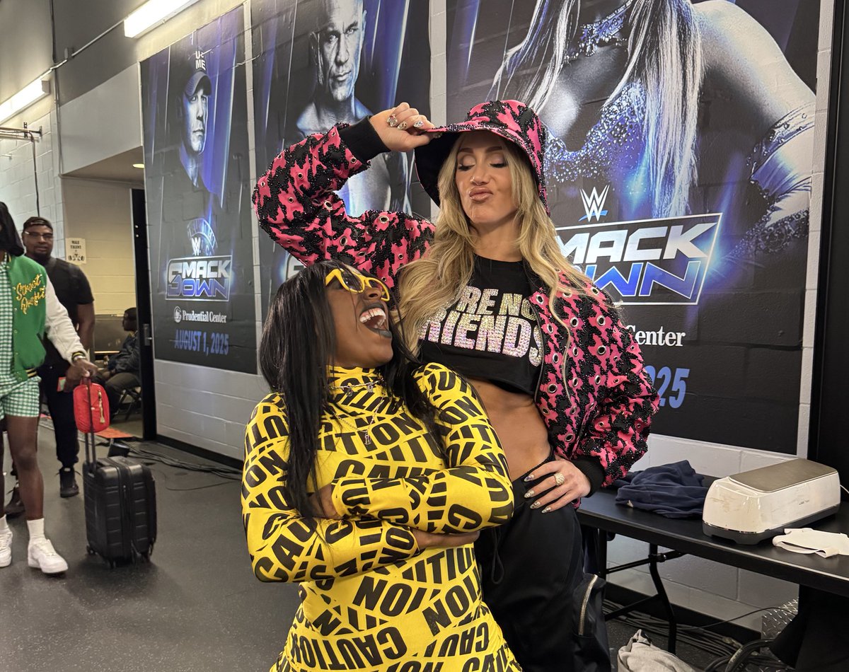 MsCharlotteWWE's tweet photo. Chaaaaaaaaamps @TheTrinity_Fatu caution. https://t.co/WheMr0bcAu