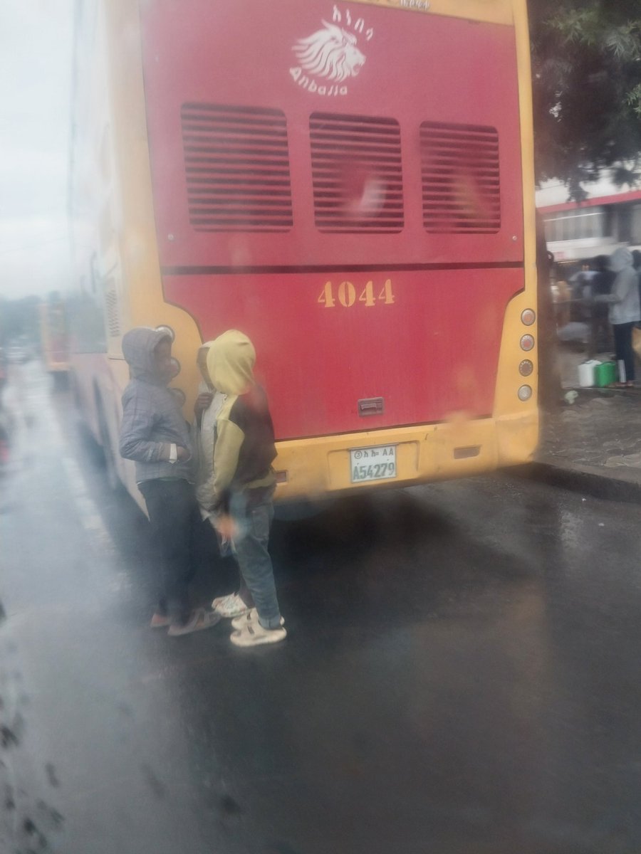 Catching heat from the engine at the back of the bus, trying to stay warm until it finally moves… 💔💔💔💔