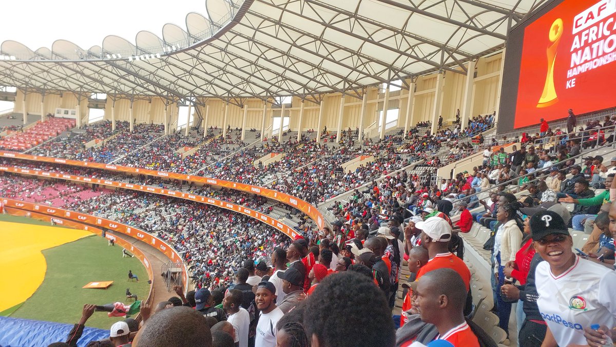 CHAN2024 Kenya vs Congo,  Political ticket hoarding kept a lot genuine fans out, we had empty seats despite "sold out" claims. Leading to lesser vibrant atmosphere and fewer Congolese fans, dimming the match's international vibe.. iyo utoto wacheni. #CHAN2024 #KenyaFootball