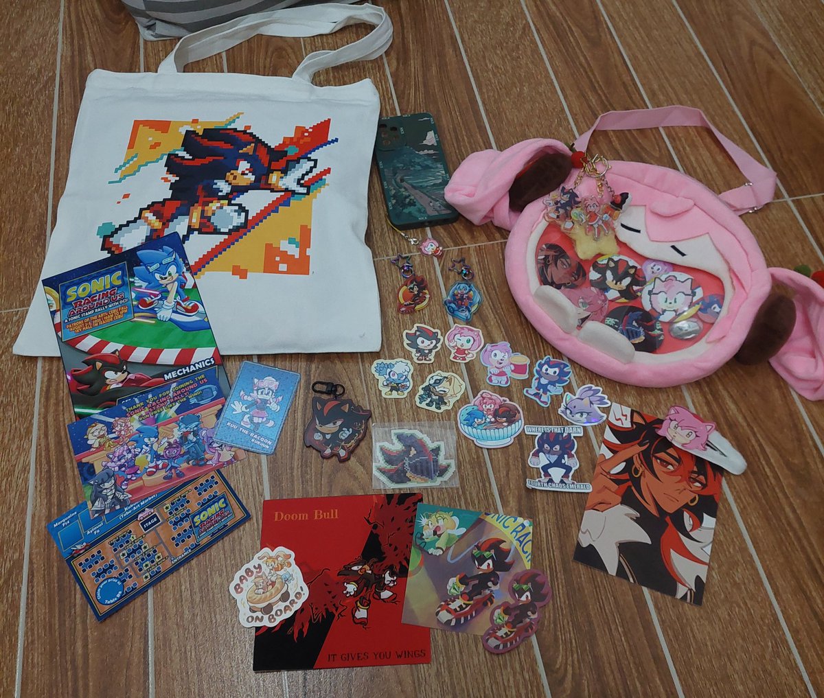 Im waiting on pics and also I conked out last night after Day 2 

so have the sonic haul + gifts/art trades from my stamp rally mates and moots 💖

a few artists i can mention made these!
<a href="/porplchic/">🐣 Porplchic 🐣</a> <a href="/projectshadovv/">raiji ⚔️</a> <a href="/koucheese/">cheese @ cosmania & cf21</a> <a href="/ayinvui/">yiyin⁷♡🌸✨️</a> <a href="/charlenesketch/">charlenesketch.bsky.social</a>