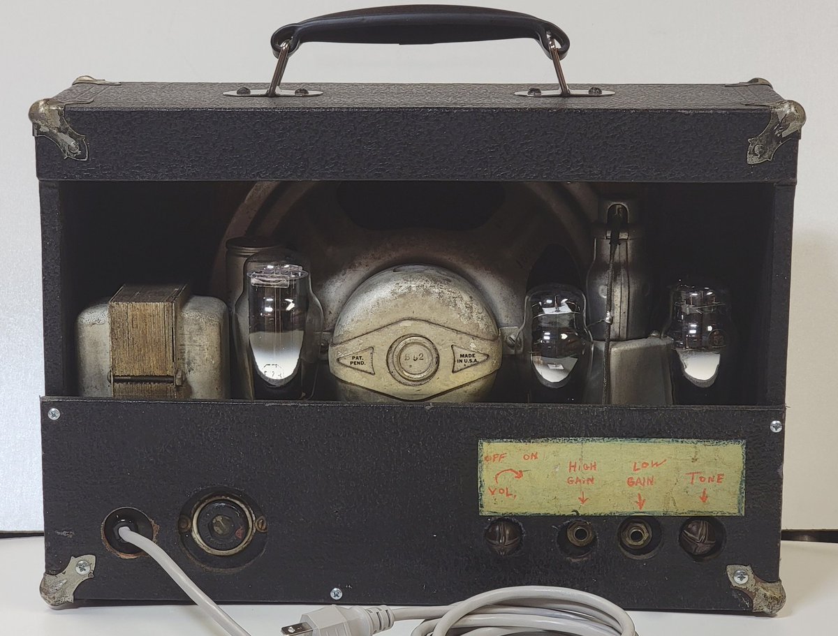 1936 Rickenbacher Style 3. Left the note taped to it, it earned that after decades. (Not to mention the clean rectangle under it.)

Still need a Style 2 for the 1-4 set.