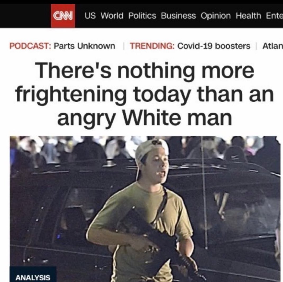 Why did they attack a man with a gun?

Was it because he was white?