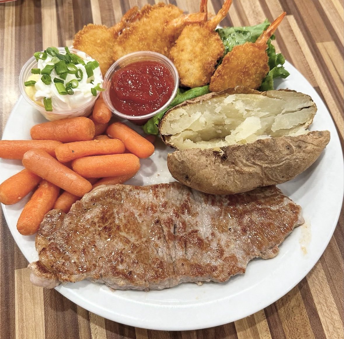It’s Sunday Dinner

New York Steak and Shrimp
at Norms in Hollywood.

New York Steak (Medium) with 6 Fried Shrimp, Soup, Salad, Baked Potato, and a Daily Vegetables.

#norms #inthe323