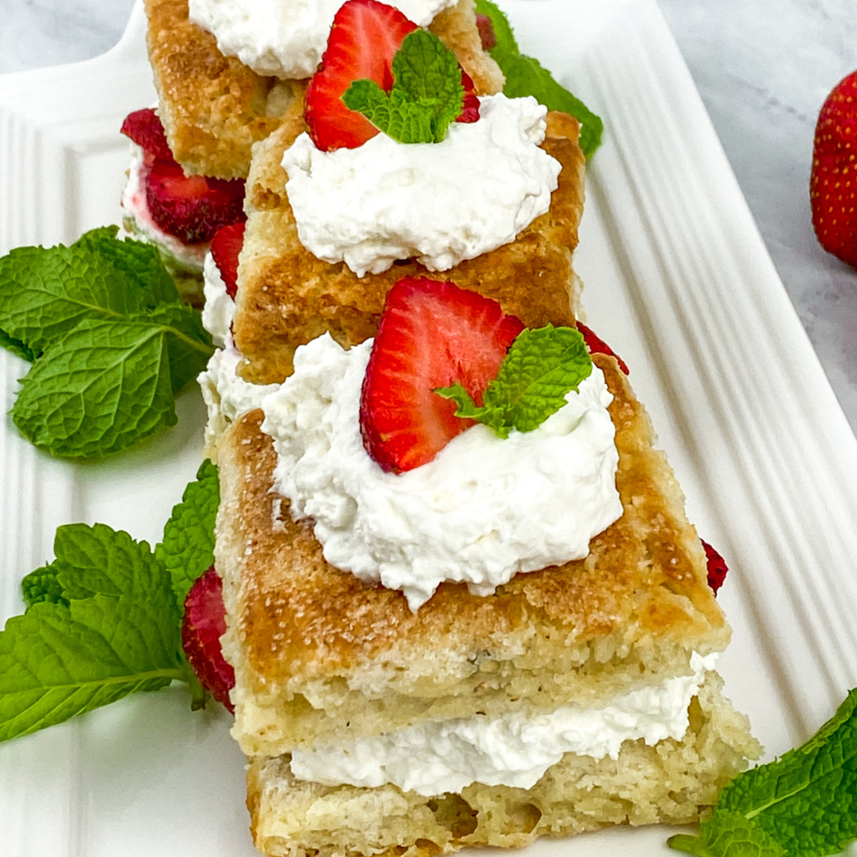 Make this easy Strawberry Shortcake from scratch. Sweet, simple, and fresh!  #dessert #strawberryshortcake #farmersmarketweek blogghetti.com/homemade-straw…