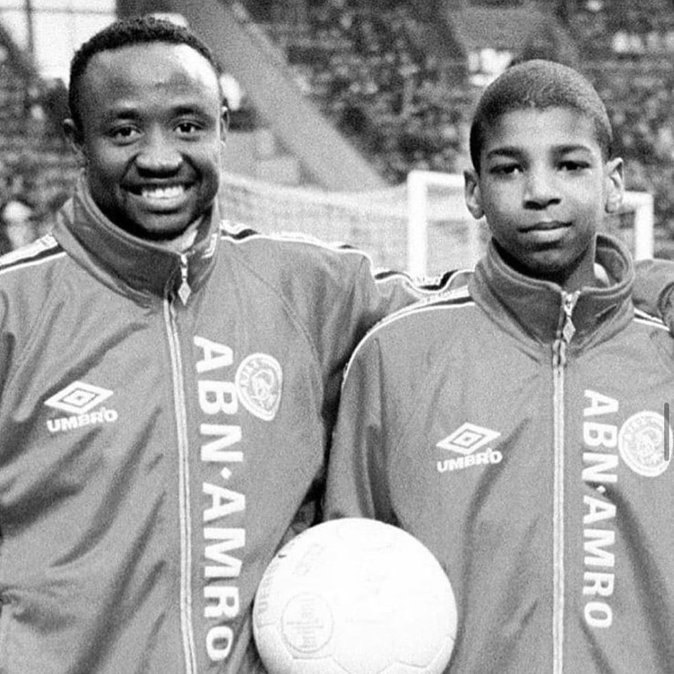Ajax’s Tijani Babangida with a young Ryan Babel.