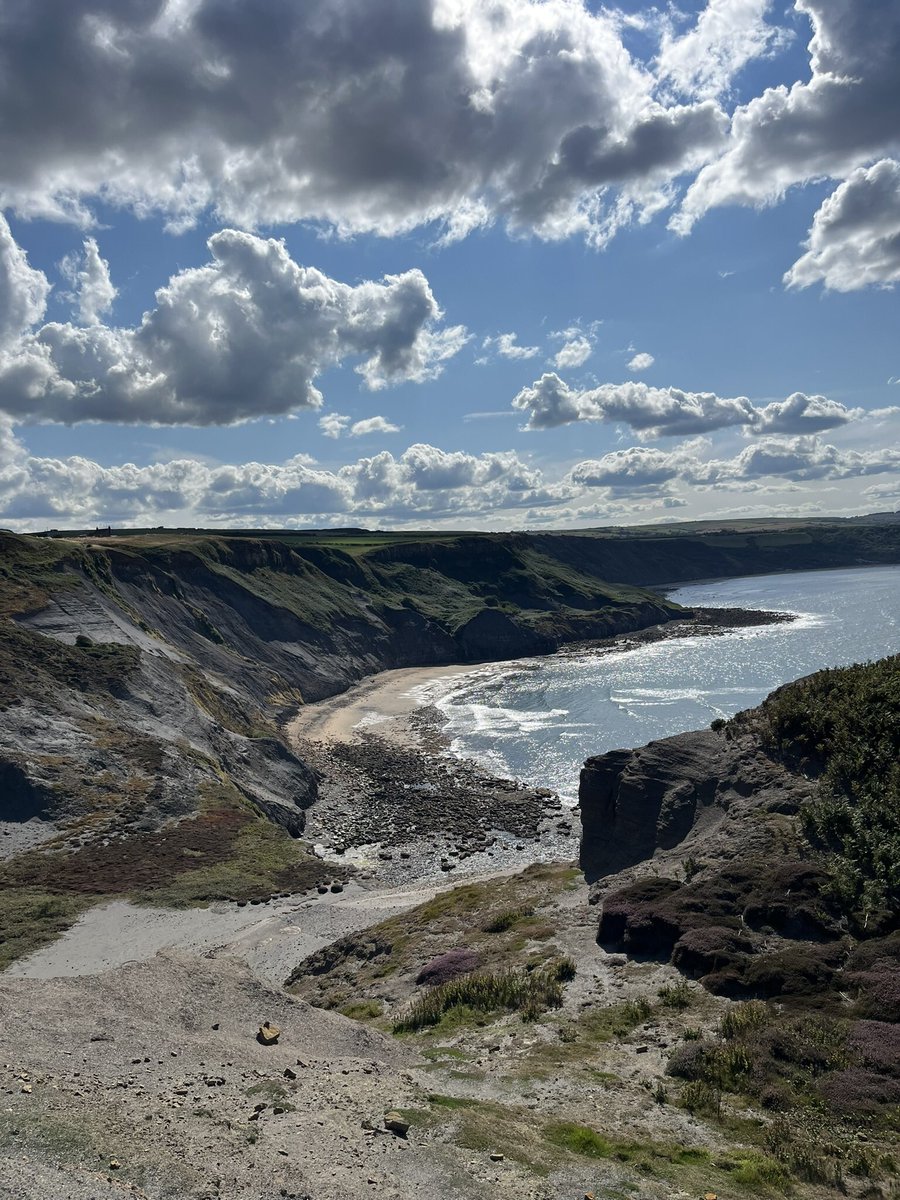 There must be an angel 
Somewhere in those
Billowing clouds
Casting sunbeams into 
Swirling waves
Spreading heavenly drama
Across high ground
Watching over me
As I bask in the sound…

Of silence.

 #vss365