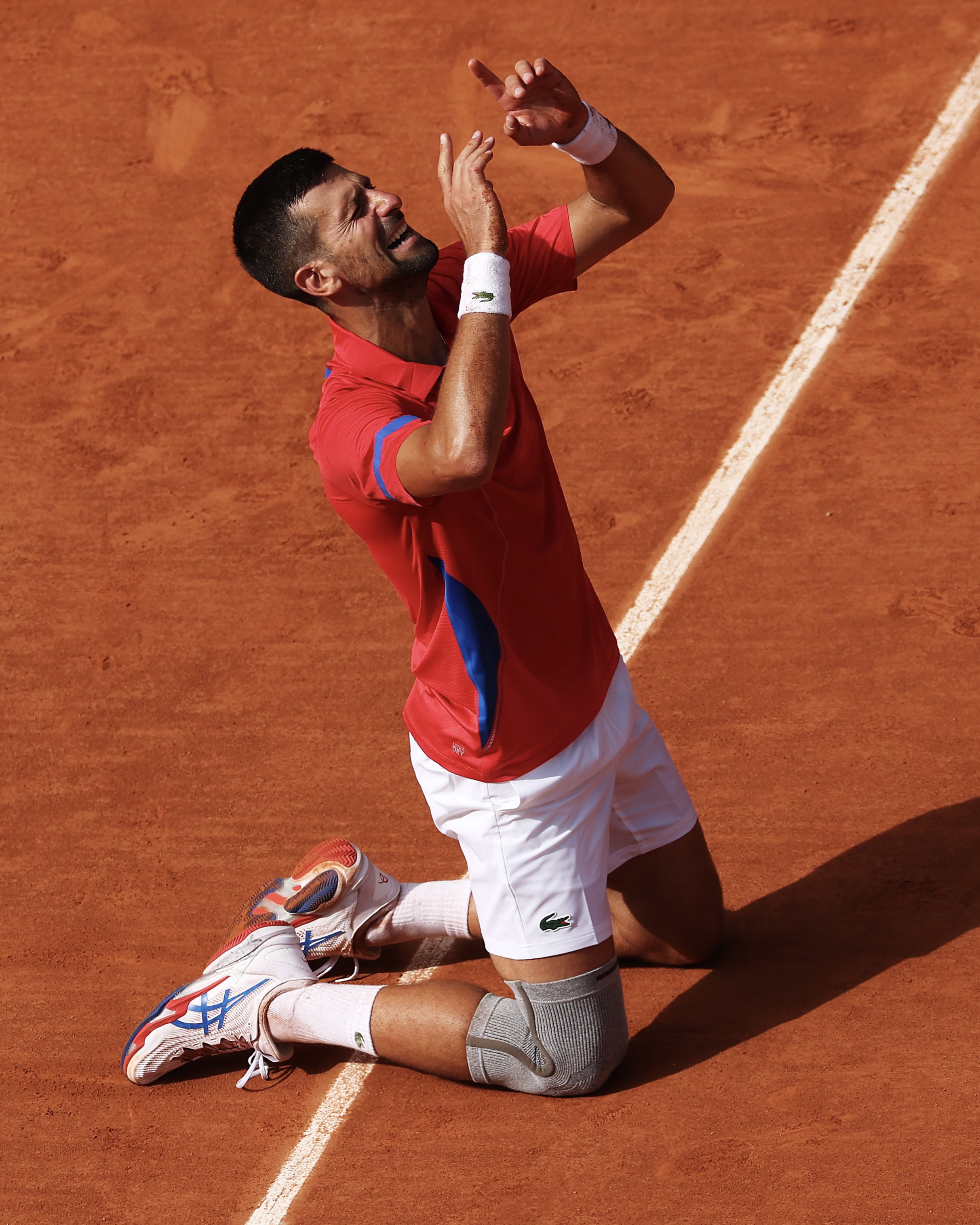 Gxge7lGX0AAy6CL?format=jpg&name=4096x4096 When Novak Djokovic Shook with Emotion — The Day He Gave Everything to Win Olympic Gold