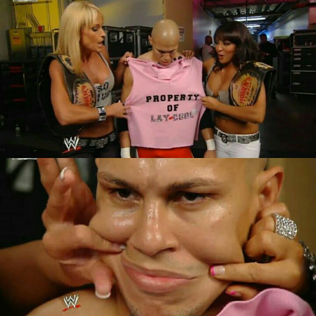 FBEENEEOY's tweet image. #LayCool (@McCoolMichelleL &amp;amp; @mslayel) gifting @OneWorldWarrior the Property of LayCool pink polo shirt and once again making him turn that frown upside down when he's... not too pleased with it.
