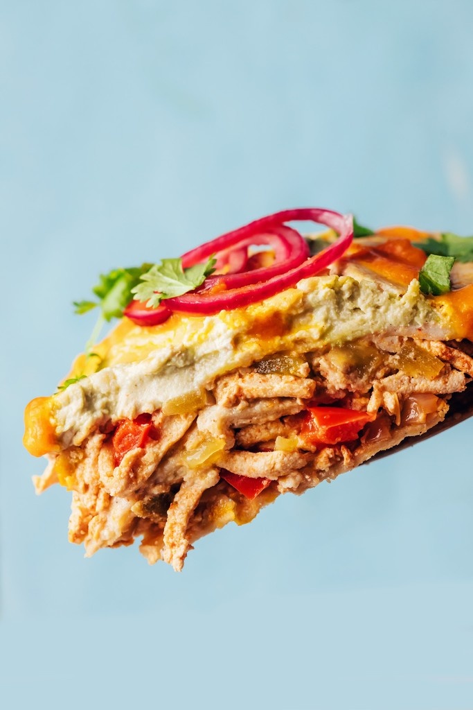 Hatch chile season is here! And this is the dinner to make: Vegan Green Chile CASSEROLE! 💚 Smoky shredded tofu &amp; veggies 🧅🫑 are layered with corn tortillas + a creamy, cheesy cashew sauce! It's satisfying + protein-packed! Tap the link for the recipe: l8r.it/zghD