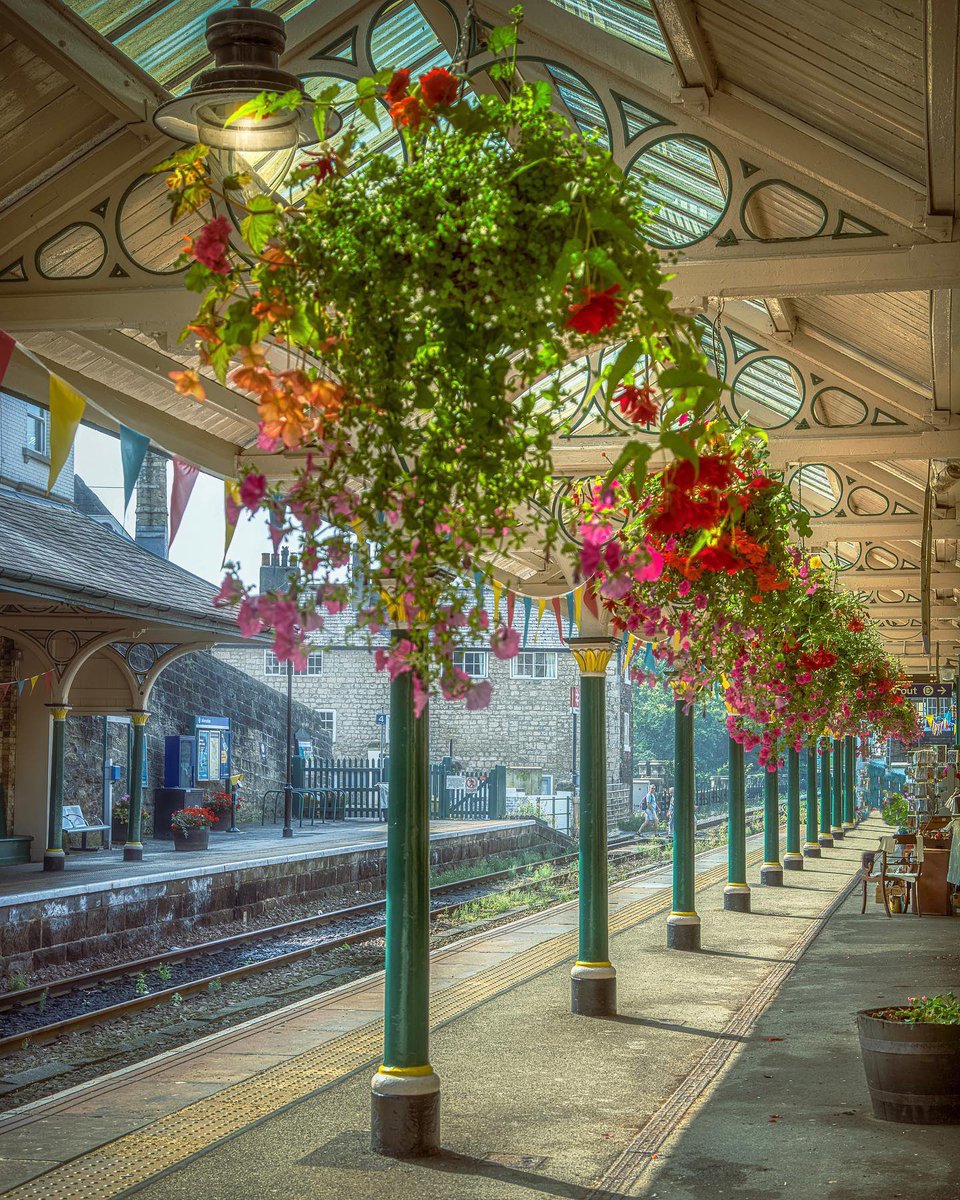 Beautiful Knaresborough Railway Station with lovely cascading floral displays below the Victorian arches.