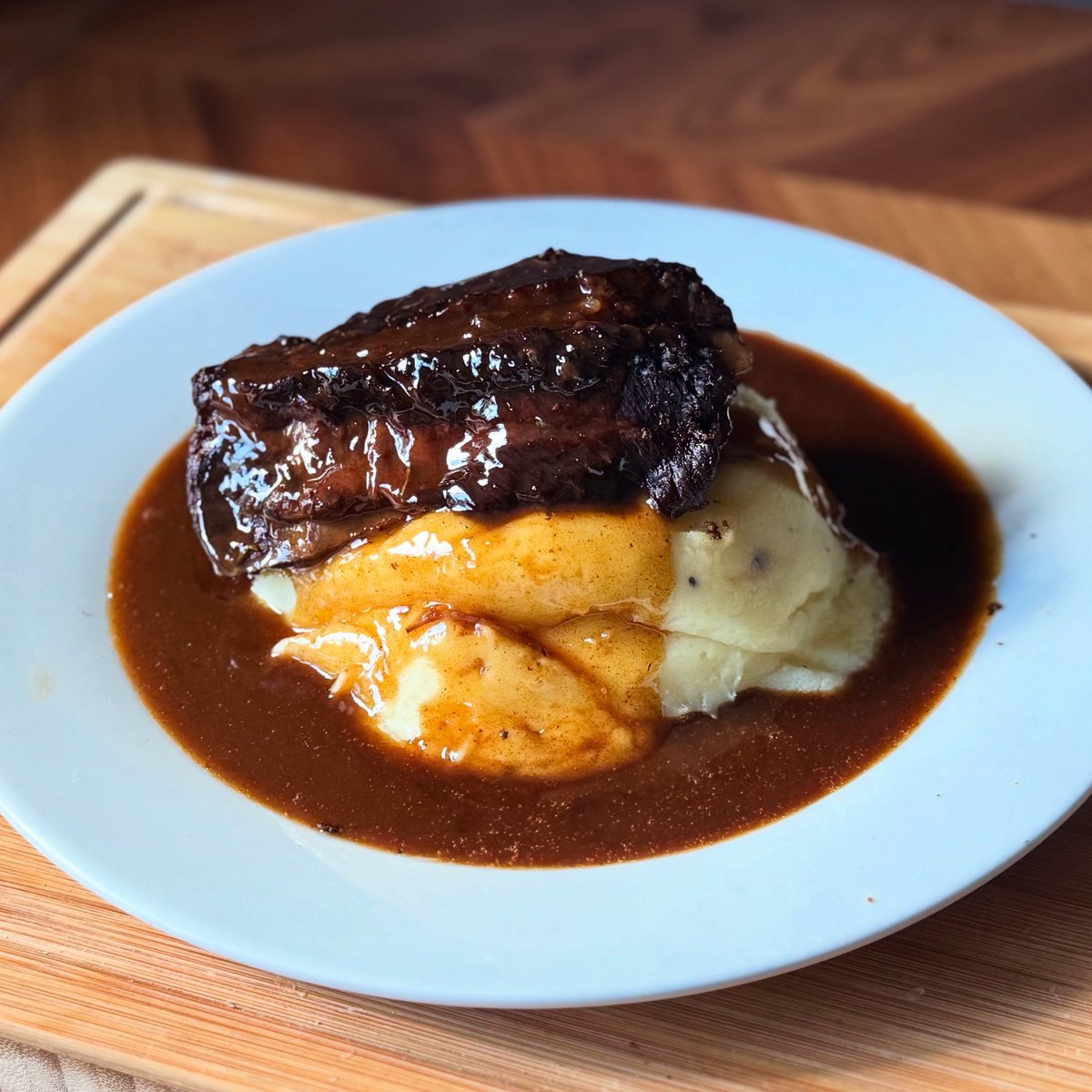 4.5 hour braised beef short rib with garlic and herb mash topped with a beurre rouge sauce 
My best cook yet