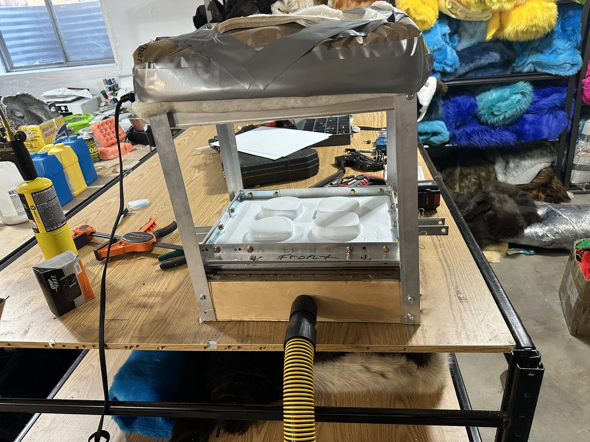 Finally finished and it works perfectly 

Part of being a fursuit maker is making stuff.
Built my own vacuum form since they tend to be pricy and it works great. 

Small tweaks make a giant difference in vacuum pressure and heat management