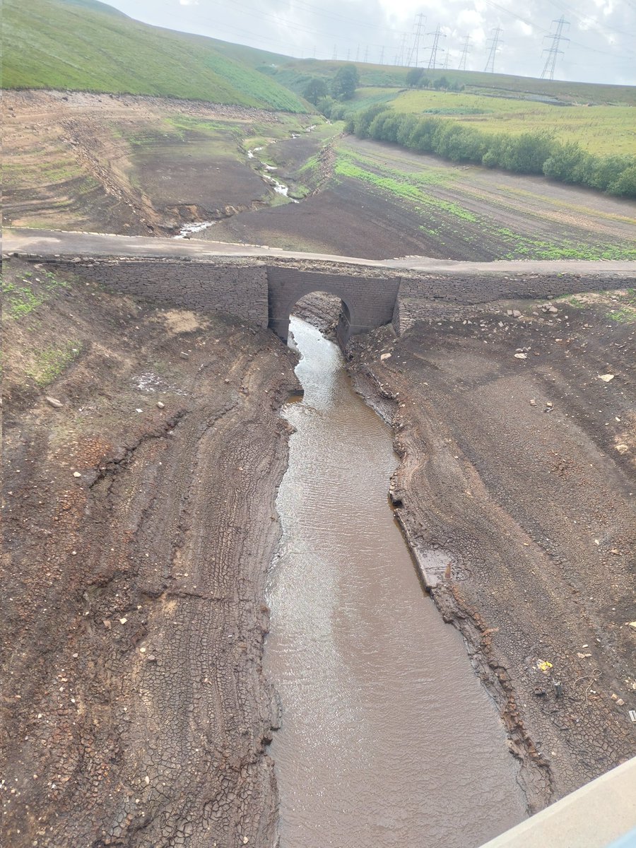 Taken today. The old bridge at Baitings Dam, near Ripponden, Halifax.  It's normally completely submerged in water.  I have never seen this bridge before. There is no wonder a hosepipe ban is in force in the West Yorkshire area.