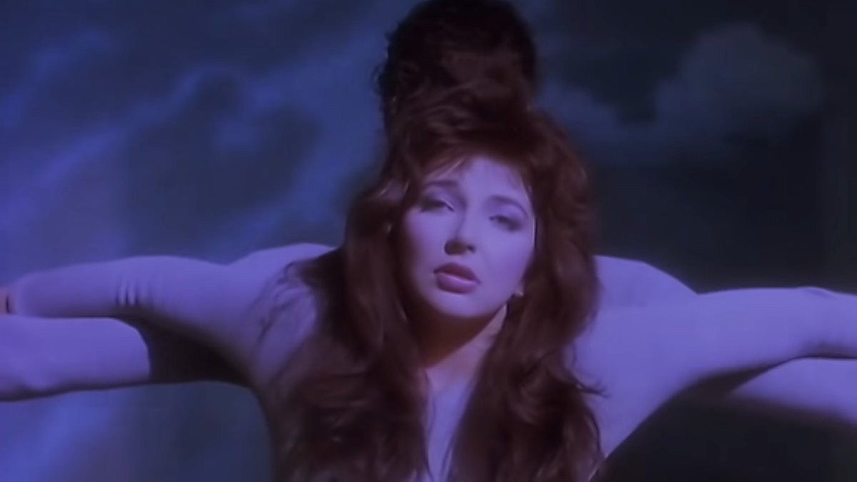 PopCrave's tweet image. 40 years ago today, Kate Bush released “Running Up That Hill (A Deal With God).”
