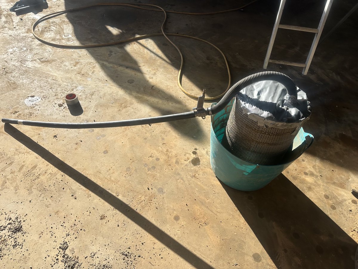 Bit hard to see but had to clean a fuel tank out that got contaminated with canola pod, used a venturi vacuum from tire store to suck out, used the old engine airfilter to cut down atomised fuel in the air and deposit contaminants in there.