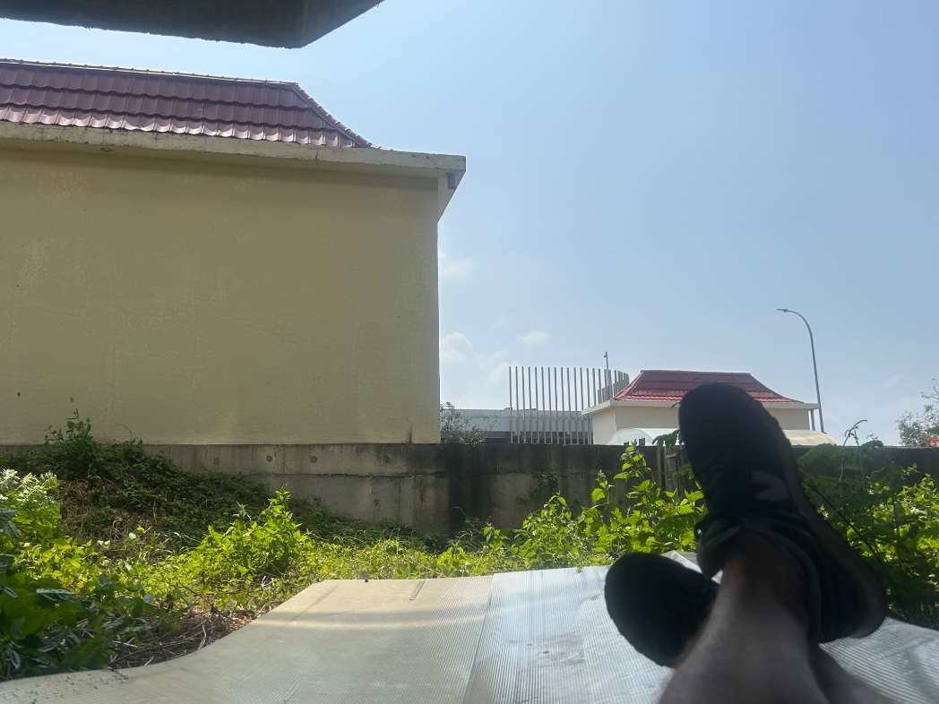 My AirAsia flight is three hours delayed, and I am chilling under the train station bridge on a piece of plastic roof. Not sure why people get upset about flight delays.