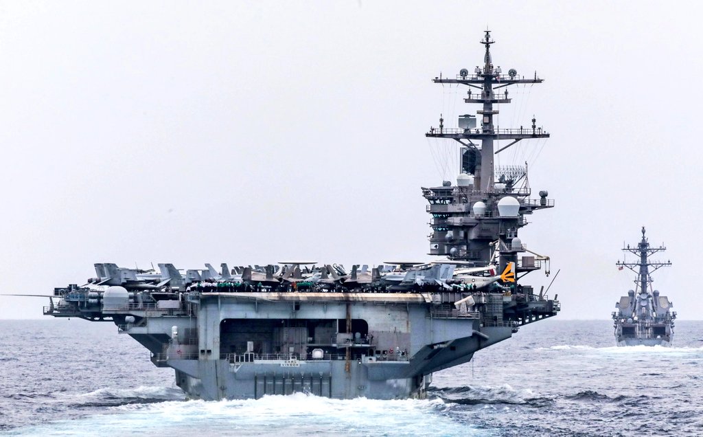 USS Carl Vinson (CVN-70) and USS Sterett (DDG-104) transit the Surigao Strait (July 20, 2025). Did you know that a full carrier strike group, with its air wing, escorts, sub, and 6,700 crew, costs around $6.5 million per day to run? 😮 Buying an aircraft carrier is expensive.