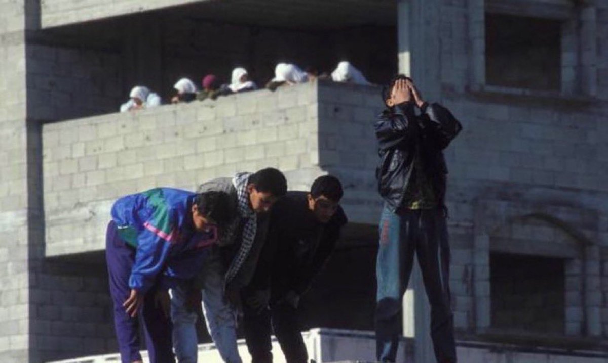prayer between friends, palestine 1994