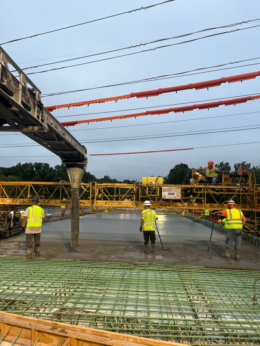 Crews place concrete for the deck of the Route 21 bridge over Grants Trail, near Tiffany Square Parkway in St. Louis County.  The bridge is one of two in the area getting worked on as part of on-going construction along Route 21 between Route 30 and the Jefferson County line.