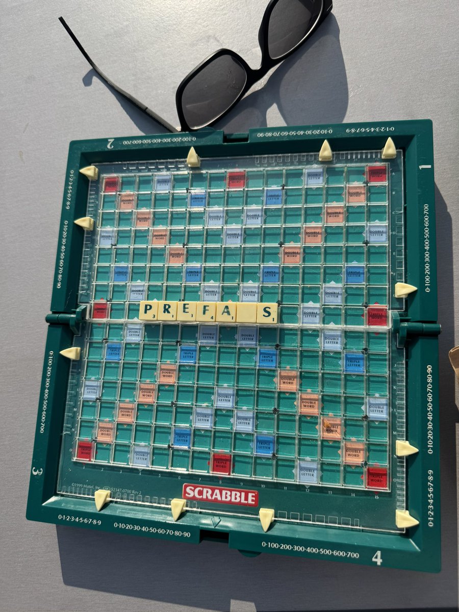 Parked for night in Burgundy vineyard so cup of tea, glass of wine and game of Scrabble