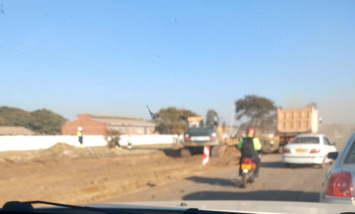 Photo of road works West of Mazorodze Roundabout on Hre Drive

They dig deep, take unstable soil &amp; cart stable soil kilometres away, fill, ram ... final surfacing.

Yellow machines, tippers+, charge per hour. Zim's USD expenses are high

#HighRoadCostsAsCorruption?