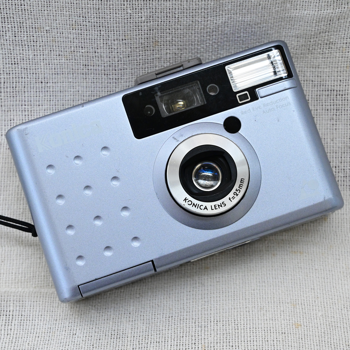 Konica - Search / X