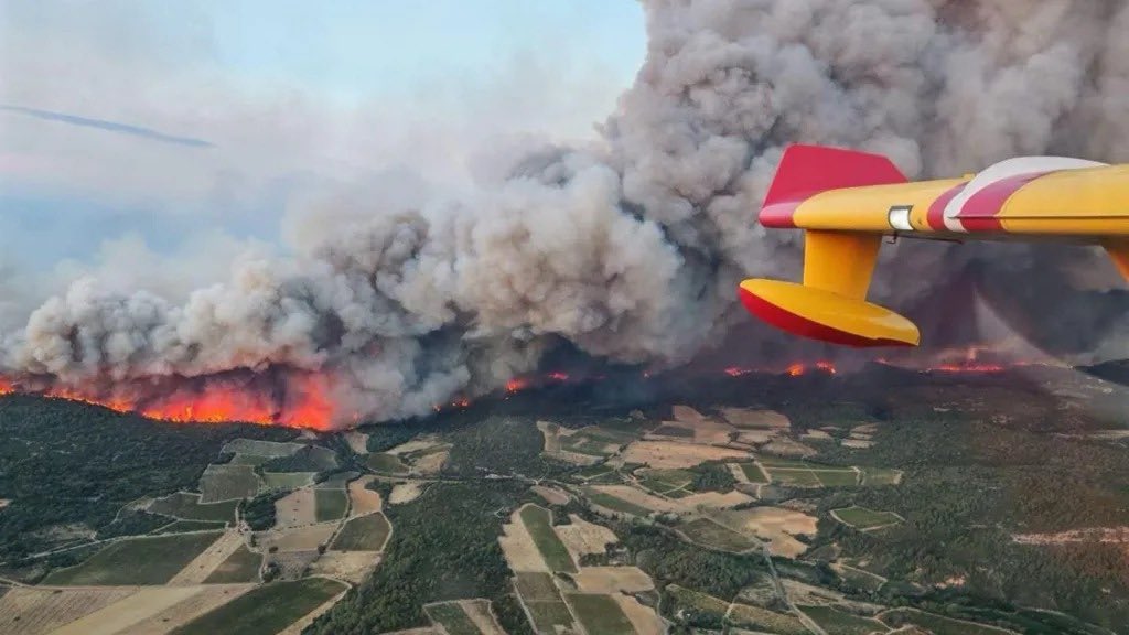 One dead and thousands without power as wildfire spreads in France
An elderly woman has died and another person is missing after a massive wildfire swept through parts of southern France, destroying homes and forcing thousands to flee.