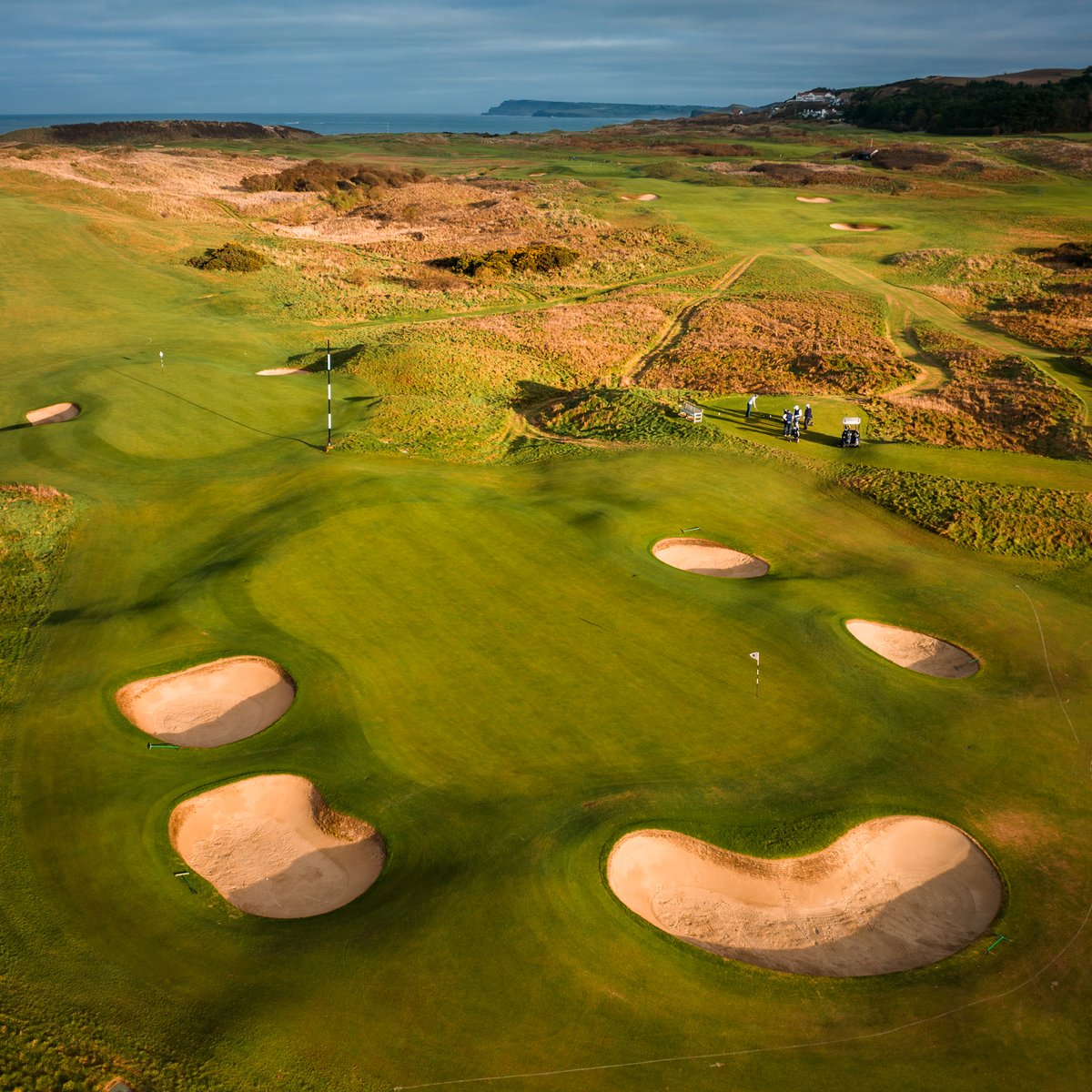 Two very different front pins. At 13, it’s downwind to a green that slopes away — making stopping the ball tough. At 17, it’s into the wind with no trouble short, offering a much more forgiving approach.

A good example of the fair course setup Graeme and his team aim for daily.