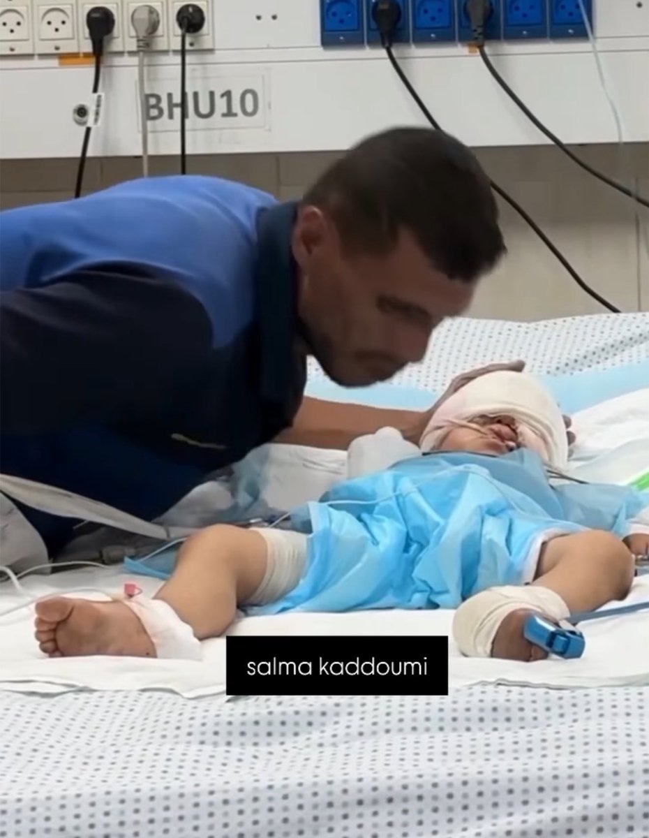 Two-and-a-half-year-old Siraj Al-Nouri is the sole survivor. His two brothers were killed and he was seriously injured in the “nutritional supplement” massacre. Siraj sustained severe head and eye injuries when the occupation bombed a group of children waiting to receive