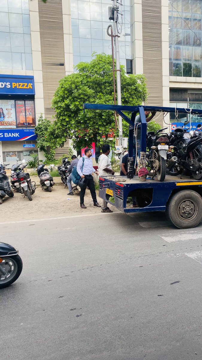 Kumar Manish (@kumarmanish9) on Twitter photo High-handedness on full display by a traffic pickup van contracted by #Ahmedabad Police.
Two-wheelers parked within the white line, no visible signage, no warning — yet lifted without a second thought.
No reasoning, no courtesy. Just brute muscle and blind enforcement, as if High-handedness on full display by a traffic pickup van contracted by #Ahmedabad Police.
Two-wheelers parked within the white line, no visible signage, no warning — yet lifted without a second thought.
No reasoning, no courtesy. Just brute muscle and blind enforcement, as if