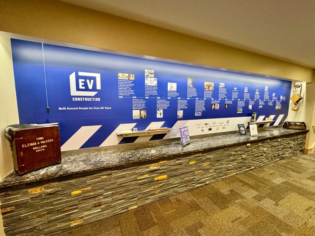 If you’ve ever visited our offices, you’ve likely passed this wall—a timeline showcasing the milestones, projects, and people that have shaped EV Construction over the past 80+ years. View the interactive version online: bit.ly/4jQcPZv