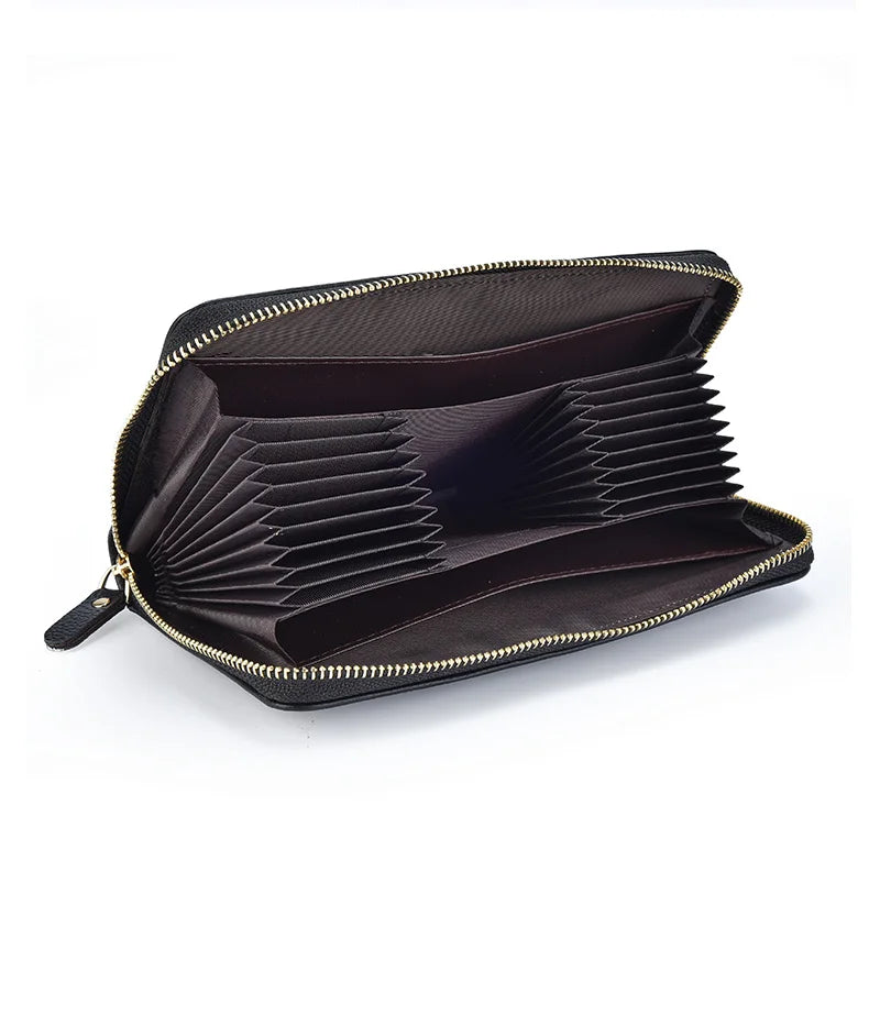 BilankasWorld's tweet image. Keep essentials organized effortlessly with our sleek wallet! Fits everything you need, crafted to last, and slips easily into your bag or hand. Simplicity meets style and practicality. #BilankasWorld #WalletEssentials bilankasworld.ca/products/long-…