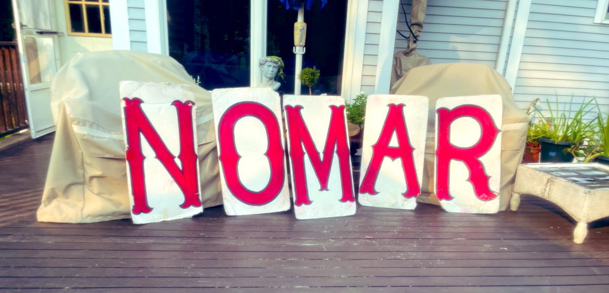 Good news, Mac! We might have to repurpose our 20-year-old N-O-M-A-R sign discovered deep in the K Men Archives… R-O-M-A-N.