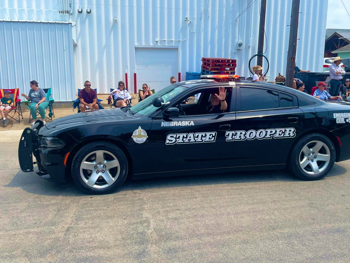 Trooper Moore #352 and her dad Sheriff Moore attending the  Wilber Czech Days parade.
