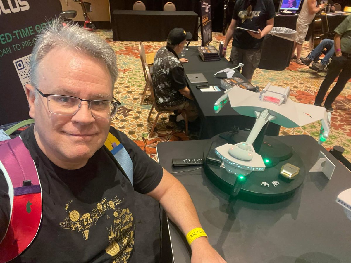 Brother Matt holding down the fort at STLV at the TOMY+ table with that new 350th scale Klingon D7!  Glenn Swanson in the background signing his new book Inspired Enterprise!