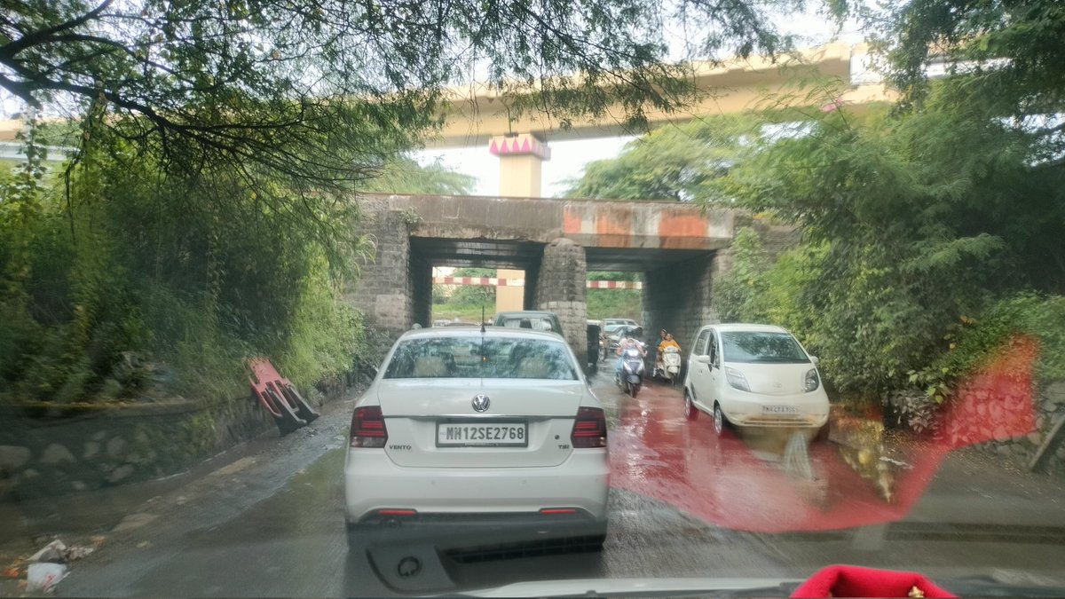 unknown_india's tweet photo. There are lot of potholes from road from Khadaki Police station to Khadaki bazar road creating jam under railway underpass.Request to @PMCPune to fill potholes at underpass and nearby road to smooth traffic flow.@mieknathshinde @CMOMaharashtra @AjitPawarSpeaks @nitin_gadkari. https://t.co/mqNgfj1iKl