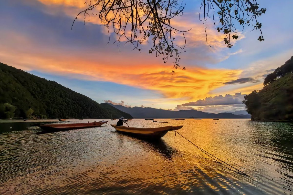 The gorgeous sunset glow of Lugu Lake in Sichuan’s Liangshan Prefecture. #ChinaTravel #scenery #travel #photography #sichuan #china