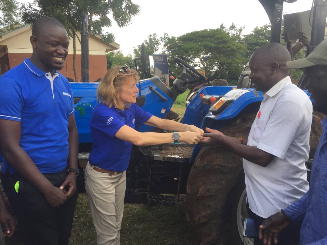 SAA Uganda (@saa_uganda) on Twitter photo Lauren Landis, <a href="/WFP/">World Food Programme</a> Uganda Country Director, handed over a tractor to Moru-Ita farmer group in Kawalakol, Karenga District. The tractor was provided under a cost-sharing arrangement between <a href="/WFP/">World Food Programme</a> <a href="/SAA_Uganda/">SAA Uganda</a> and Solanika, as part of the Agriculture and Market Support (AMS) project Lauren Landis, <a href="/WFP/">World Food Programme</a> Uganda Country Director, handed over a tractor to Moru-Ita farmer group in Kawalakol, Karenga District. The tractor was provided under a cost-sharing arrangement between <a href="/WFP/">World Food Programme</a> <a href="/SAA_Uganda/">SAA Uganda</a> and Solanika, as part of the Agriculture and Market Support (AMS) project