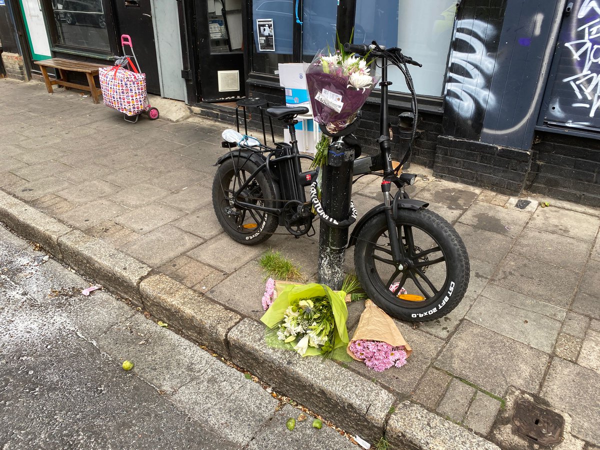 Flowers are accumulating on Dynevor Road in memory of Erdal Ozmen, the 'beloved' father shot dead near Stoke Newington High Street on Tuesday.