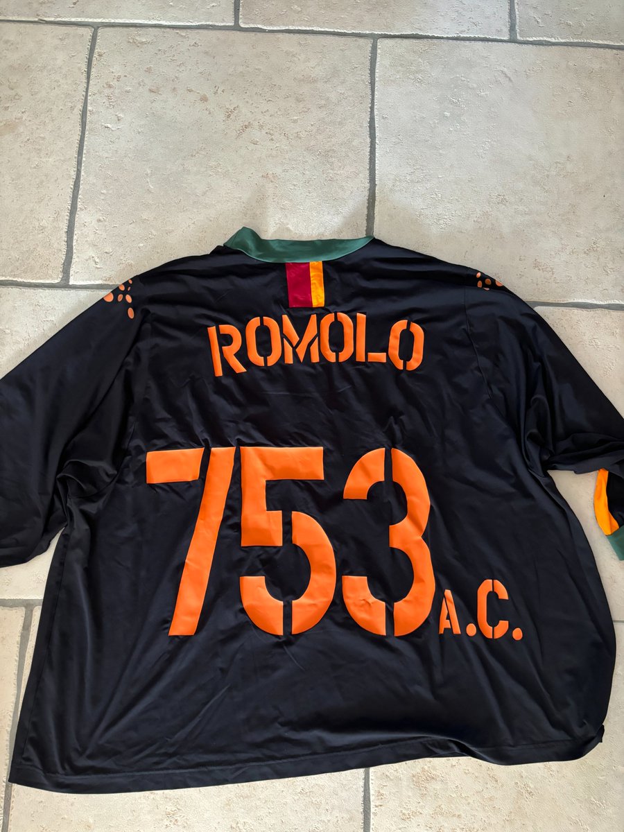 A worn AS Roma mascot shirt in the year 2004/2005 during the Champions League period.