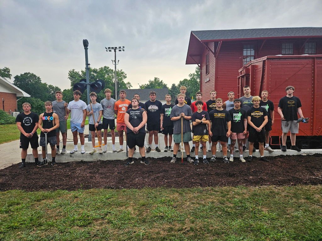 Some of the Mid-Prairie Football guys volunteered at the Kalona Historical Society this morning. Mulch was put down. Many hands make light work.