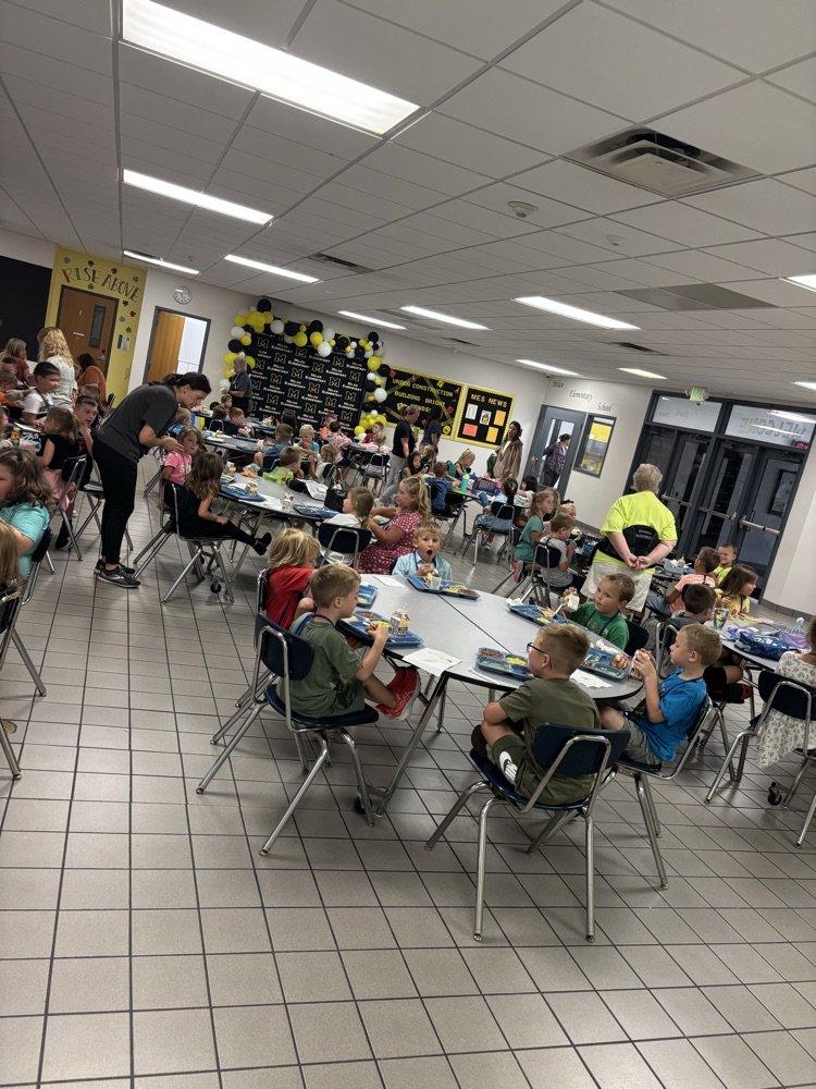 Kindergarten students joined MES today and have made it to lunch! 🖤💛