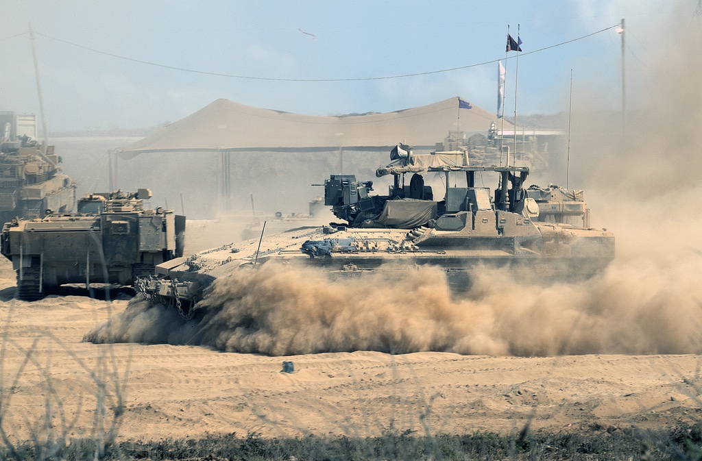 ShanghaiEye's tweet image. On August 7, 2025, an #IsraeliArmy #APC entered a staging area in southern #Israel near the #Gaza border. Israel&apos;s security cabinet met to discuss expanding the Gaza campaign, potentially occupying the entire enclave.