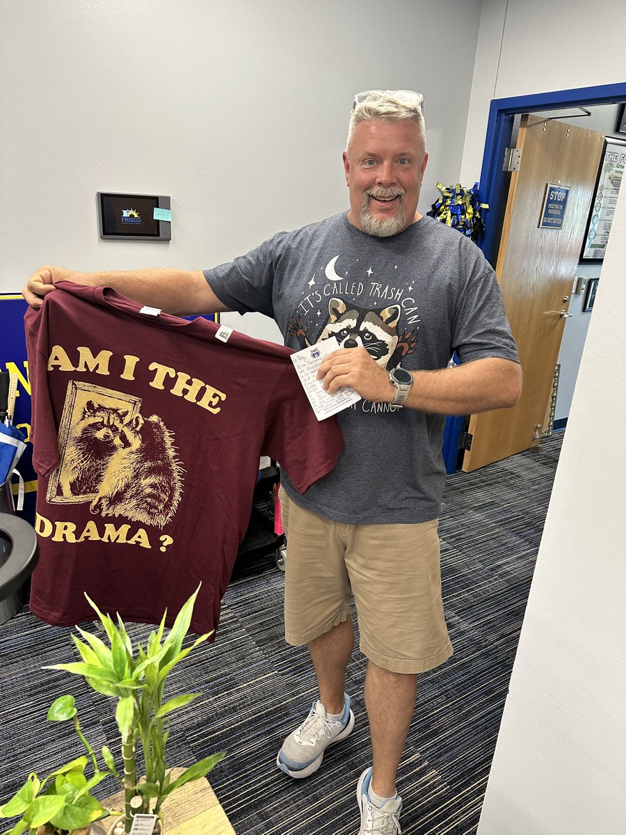 Dr. Shawn S. Perry (@drshawnperry) on Twitter photo My theater kids really outdid themselves — got me a raccoon shirt that says “Am I the Drama?” 🦝🎭
Answer: Yes. And I love drama….well the good kind!
Definitely wearing it first week back! You truly can’t have too many raccoon shirts. 😂❤️
<a href="/FHSRaccoons/">Frisco High School</a> My theater kids really outdid themselves — got me a raccoon shirt that says “Am I the Drama?” 🦝🎭
Answer: Yes. And I love drama….well the good kind!
Definitely wearing it first week back! You truly can’t have too many raccoon shirts. 😂❤️
<a href="/FHSRaccoons/">Frisco High School</a>