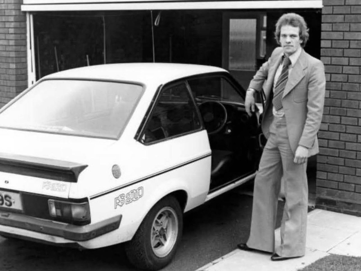 Andy Gray with his Escort ….