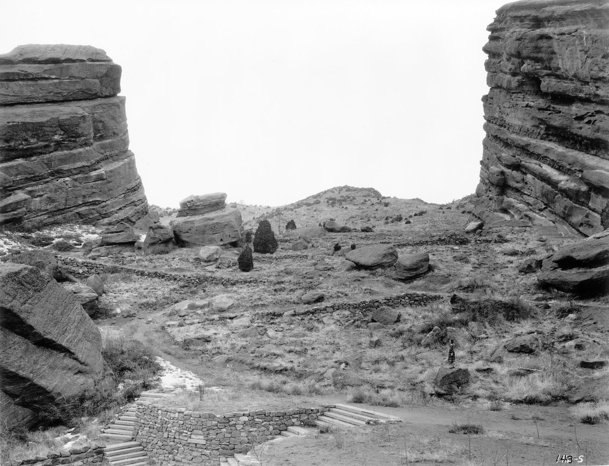 Jeffco Colorado (@jeffcocolorado) on Twitter photo Throwback Thursday: Red Rocks (Pre-Amphitheatre)
This photo from 1930-1937 shows a woman in a sweater and a plaid skirt standing on a rock and looking at rock formations in Red Rocks Park, a Denver Mountain Park in Jefferson County. Also shown is a dirt path, flagstone stairs Throwback Thursday: Red Rocks (Pre-Amphitheatre)
This photo from 1930-1937 shows a woman in a sweater and a plaid skirt standing on a rock and looking at rock formations in Red Rocks Park, a Denver Mountain Park in Jefferson County. Also shown is a dirt path, flagstone stairs