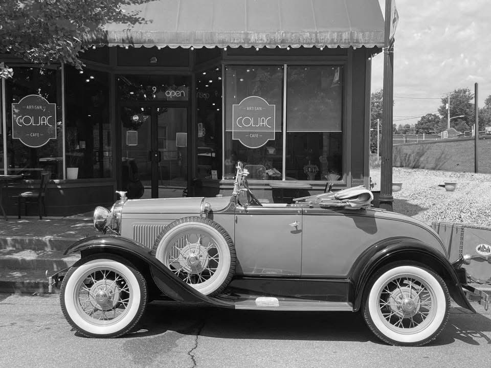 This picture was taken today in Farmington, MO in front of a building built in the 1890s of an automobile built in 1931👍.